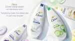 Advertising image showing four bottles in the new Dove Body Wash range.